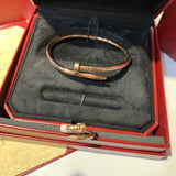 Front view of Cartier unisex jewelry piece