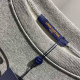 Back view of Louis Vuitton luxury clothing with everyday silhouette