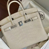 Side view of tailored structured handbag