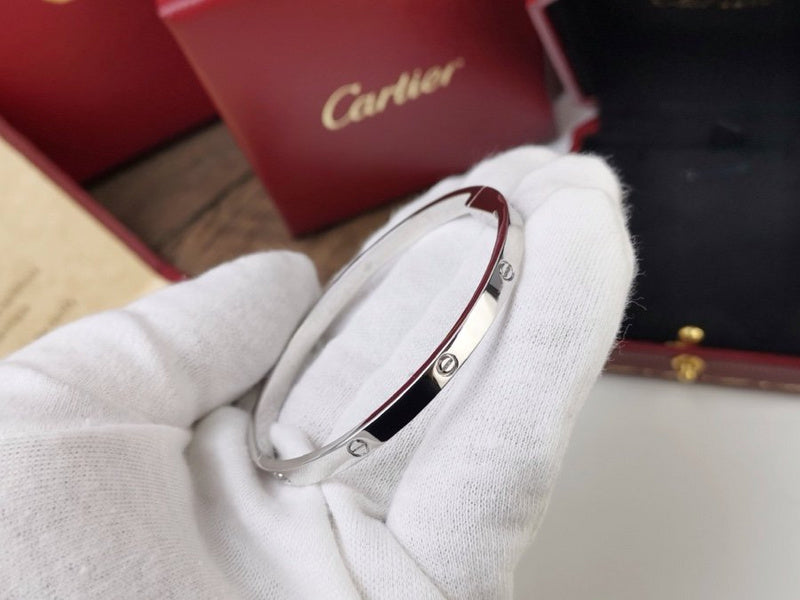 Front view of Cartier unisex jewelry piece
