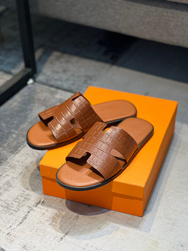 Hermes shoes Style 021 - front view, iconic logo design