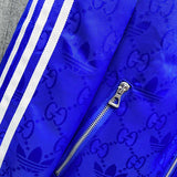 Close-up detail shot of Gucci luxury clothing with label-forward styling