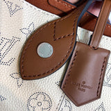 Styled lifestyle shot of signature elevated women's handbag – women's statement bag