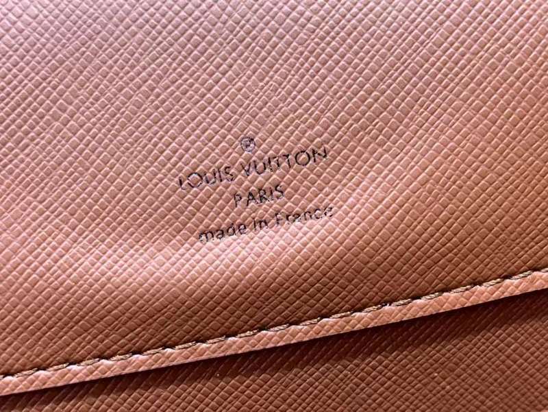 Front view of modern refined women's handbag – women's luxury accessory