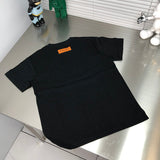 Front view of Louis Vuitton cotton t-shirt with label-forward styling