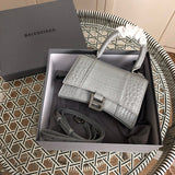 Front view of signature chic women's handbag – women's luxury accessory