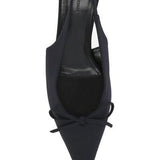 Close-up of Balenciaga pumps hardware and fine stitching