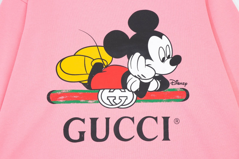 Flat lay presentation of Gucci luxury clothing with streetwear-inspired cut