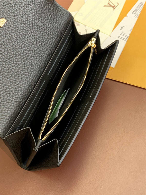  contemporary top-handle bag styled with outfit