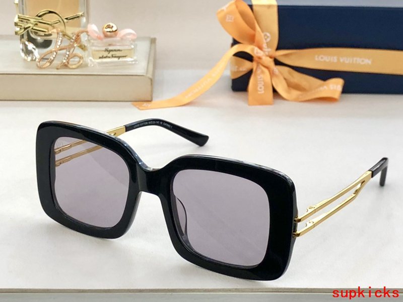 Close-up detail view of Louis Vuitton unisex sunglasses