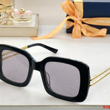 Close-up detail view of Louis Vuitton unisex sunglasses