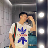 Back view of Gucci luxury clothing with signature branding