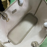 Front view of everyday-luxe sleek women's handbag – women's luxury accessory