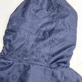 Close-up detail shot of Louis Vuitton luxury clothing with tailored silhouette