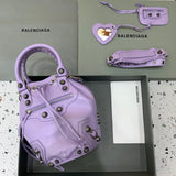 Effortless Faux Leather Handbag - Signature Hardware Accents | Women's Designer-Inspired Purse #313 - side angle view (image 2) of designer-inspired handbag