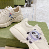 Gucci classic monochrome luxury sneakers view 4 retro runner design