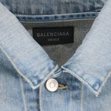 Close-up of Balenciaga outerwear hardware and fine stitching