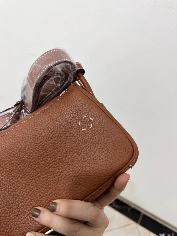 Side view of refined structured handbag