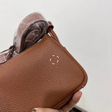 Side view of refined structured handbag