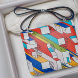 Side view of curated structured handbag