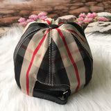 Side view of Burberry unisex cap
