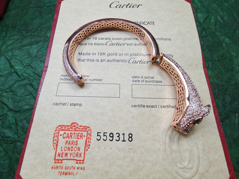 Close-up detail view of Cartier unisex jewelry piece