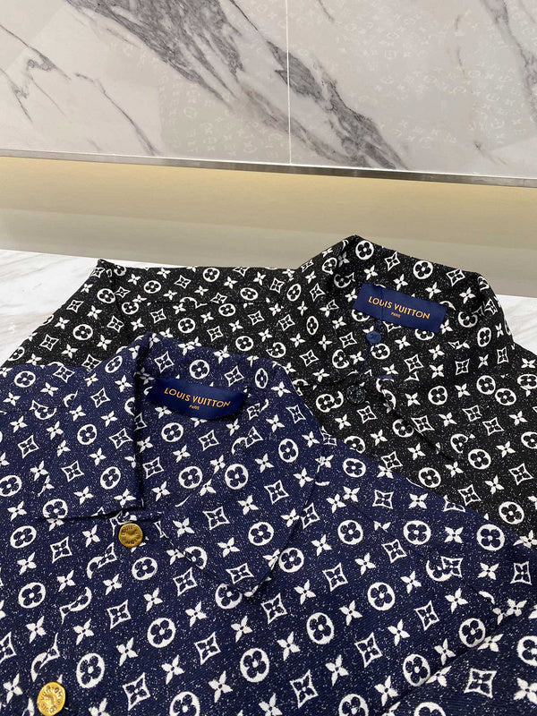 Flat lay presentation of Louis Vuitton luxury clothing with logo-detail design