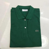 Close-up detail shot of Lacoste luxury clothing with signature branding
