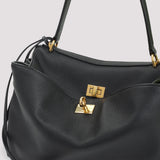 Close-up of Balenciaga shoulder bags hardware and fine stitching