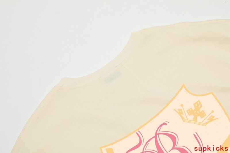 Back view of Rhude luxury clothing with monogram-inspired silhouette