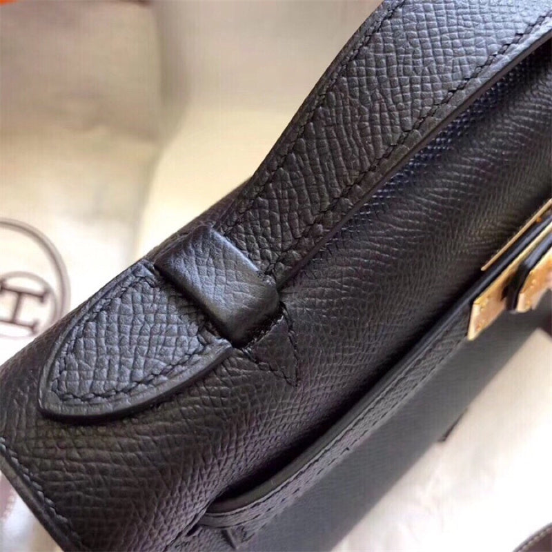 Side view of sleek structured handbag
