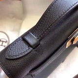 Side view of sleek structured handbag