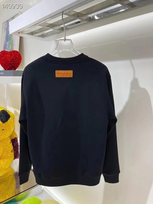 Back view of Louis Vuitton luxury clothing with runway-inspired design