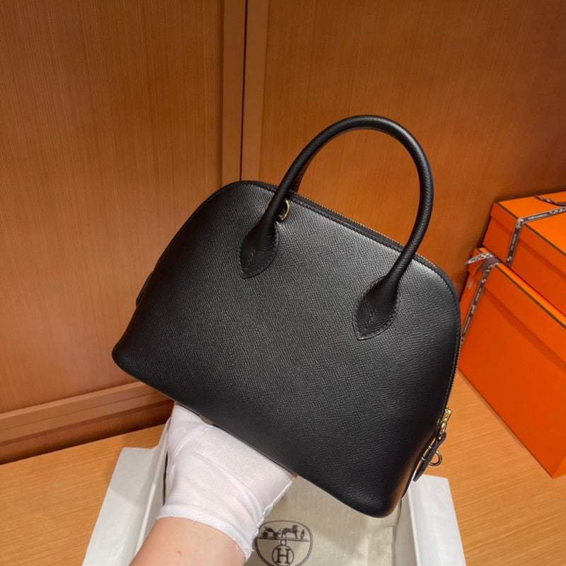 Side view of statement structured handbag