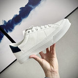 Givenchy White Pointed-Toe Stiletto Heels - Close-Up Texture View