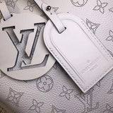 Back view of classic refined women's handbag – women's luxury handbag