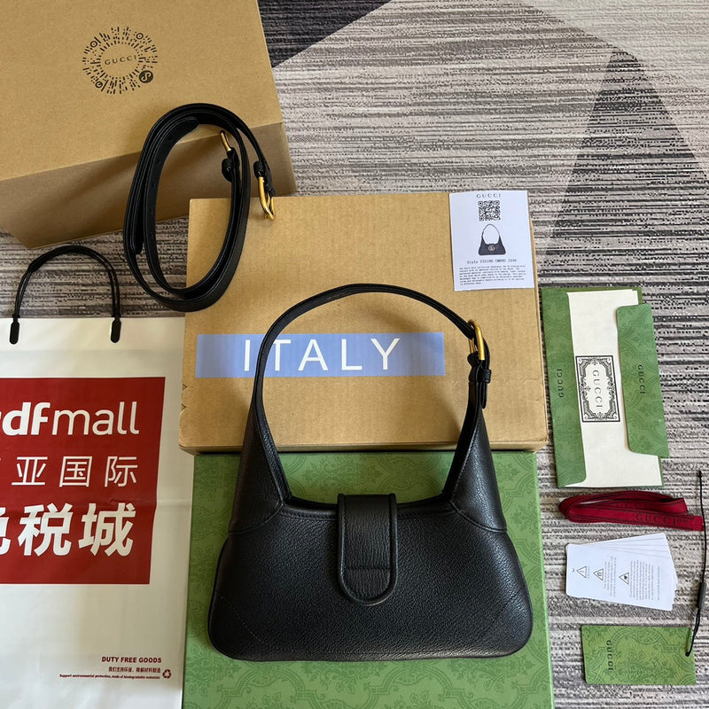 Front view of sleek classic women's handbag – women's designer-style accessory