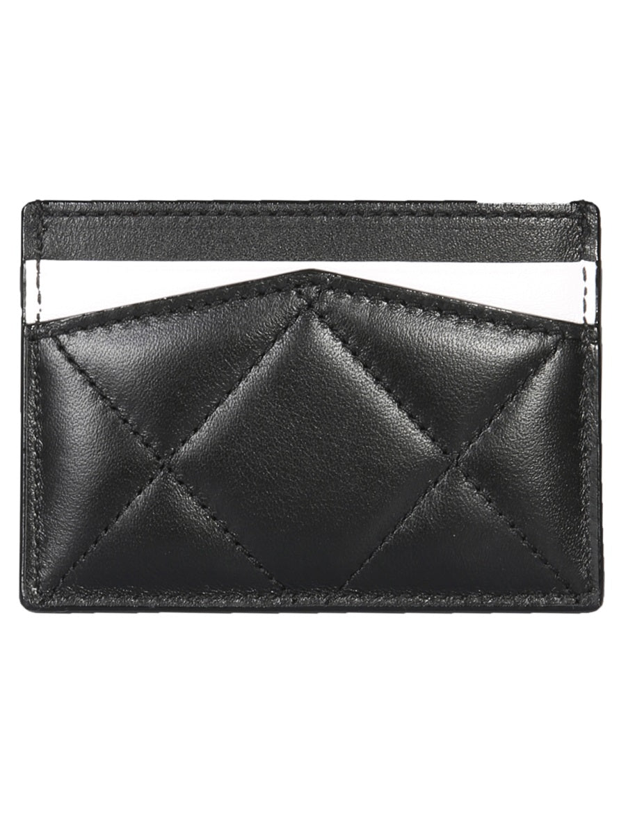 Alexander McQueen premium wallets detail and craftsmanship close-up