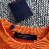 Front view of Louis Vuitton luxury clothing with logo-detail design