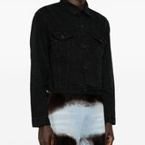 Close-up of Balenciaga outerwear hardware and fine stitching