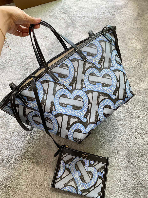Ziva's Charm handbag – side angle view (one versatile size)