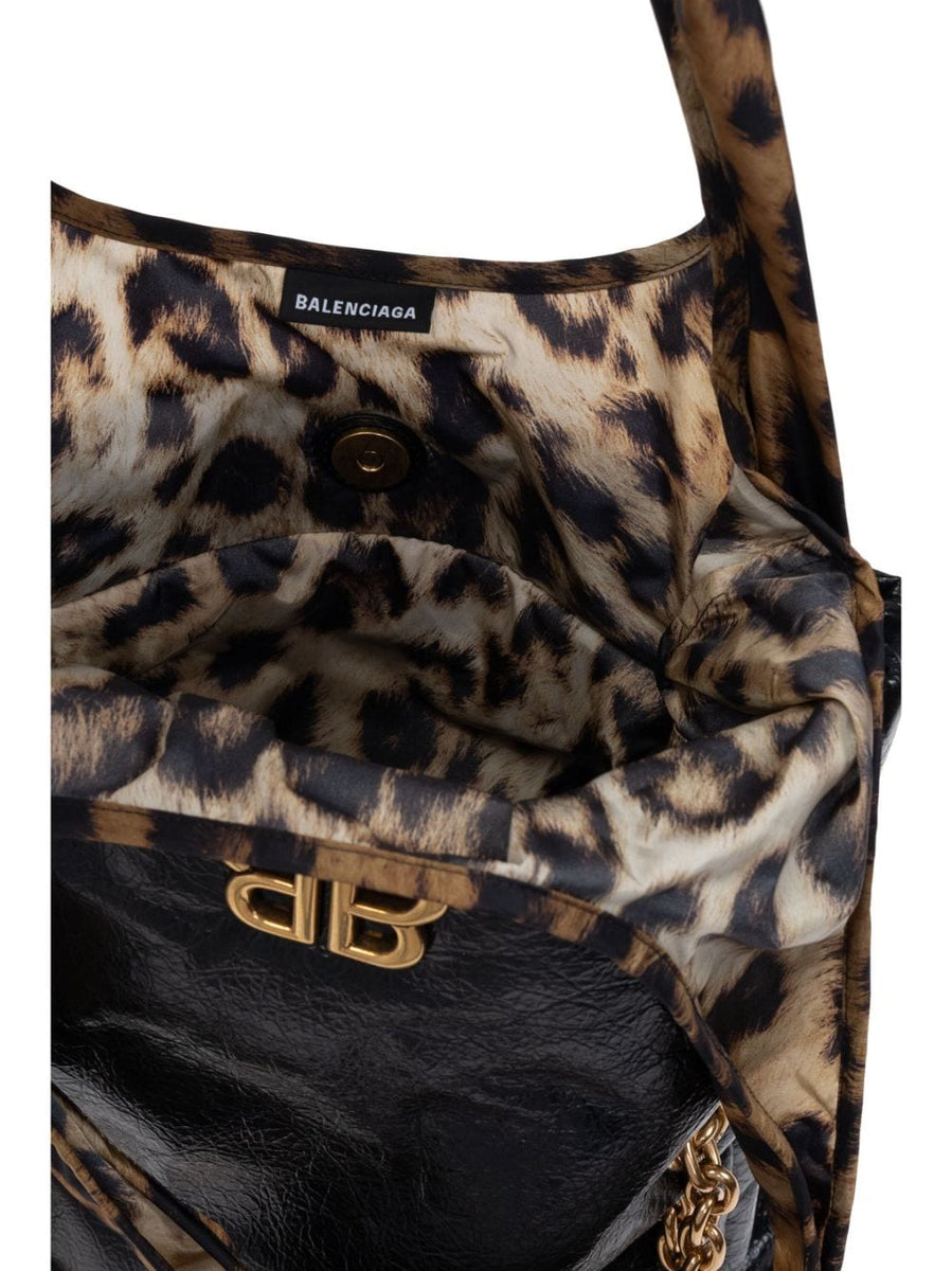 Close-up of Balenciaga handbags hardware and fine stitching