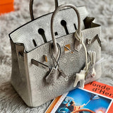  Tailored structured bag carried on shoulder