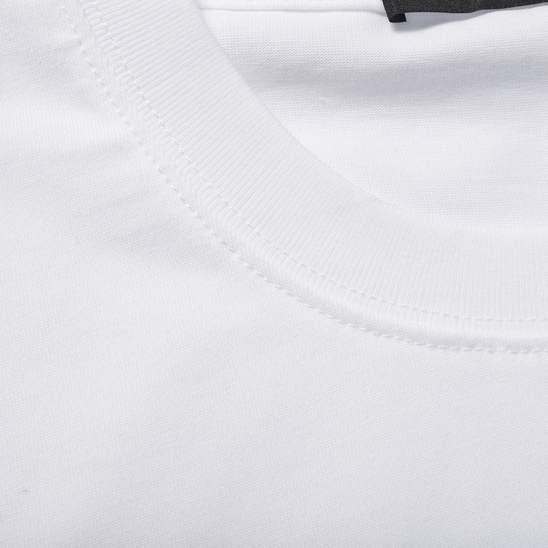 Close-up detail shot of Polo cotton polo shirt with monogram-inspired silhouette
