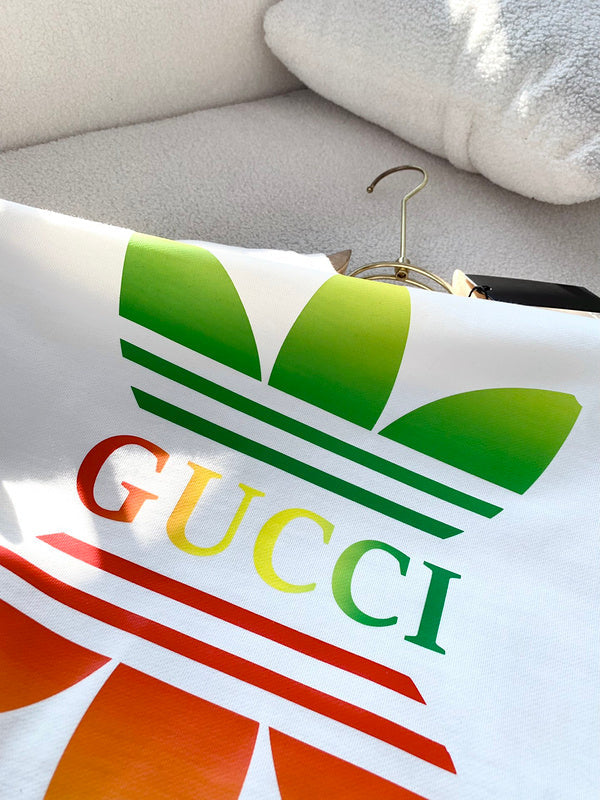 Side profile of Gucci luxury clothing with monogram-inspired silhouette