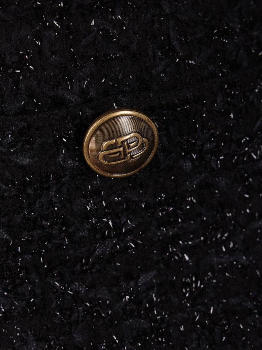 Close-up of Balenciaga jerseys & knitwear hardware and fine stitching
