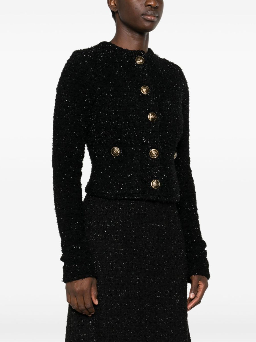 Close-up of Balenciaga jerseys & knitwear hardware and fine stitching
