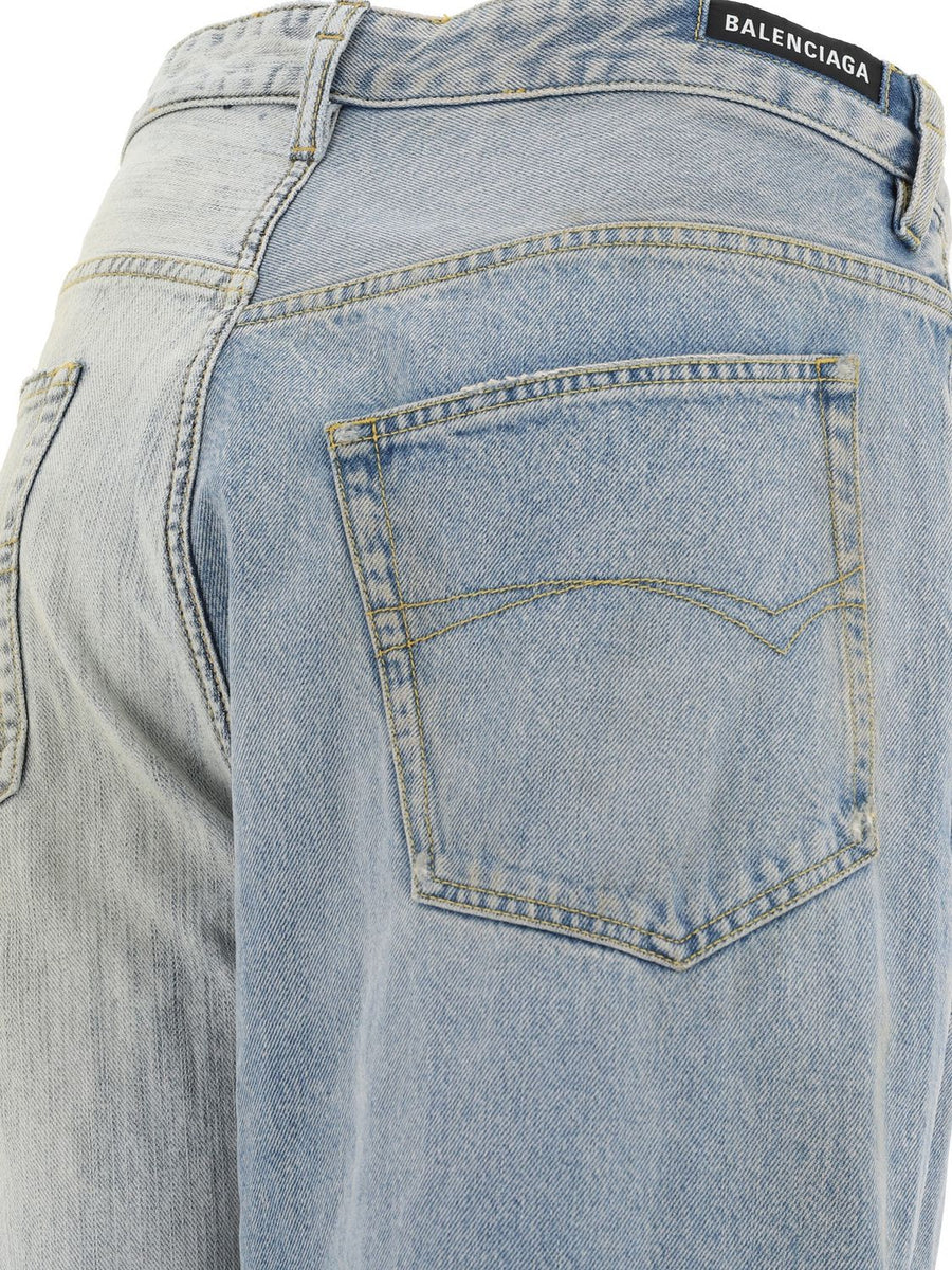 Close-up of Balenciaga pants hardware and fine stitching