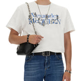 Close-up of Alexander McQueen tee shirts hardware and fine stitching