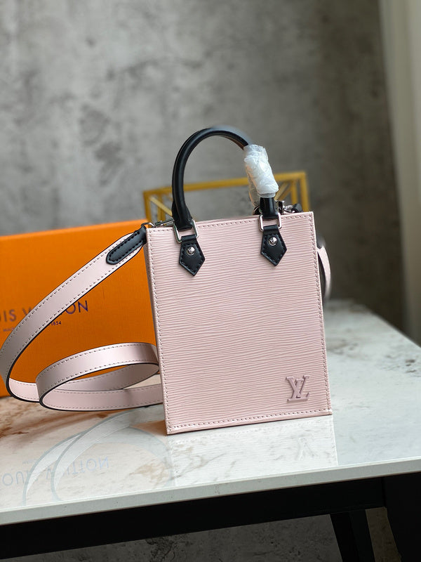 Front view of structured elevated women's handbag – women's statement bag